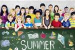 Children posing for a photo with summer camp sign